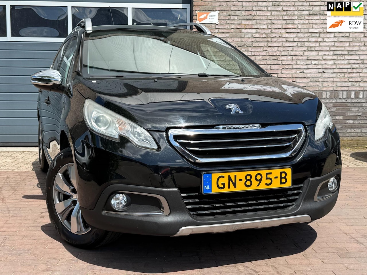 Peugeot 2008 - 1.2 PureTech Allure|Climate |Pano.dak. - AutoWereld.nl