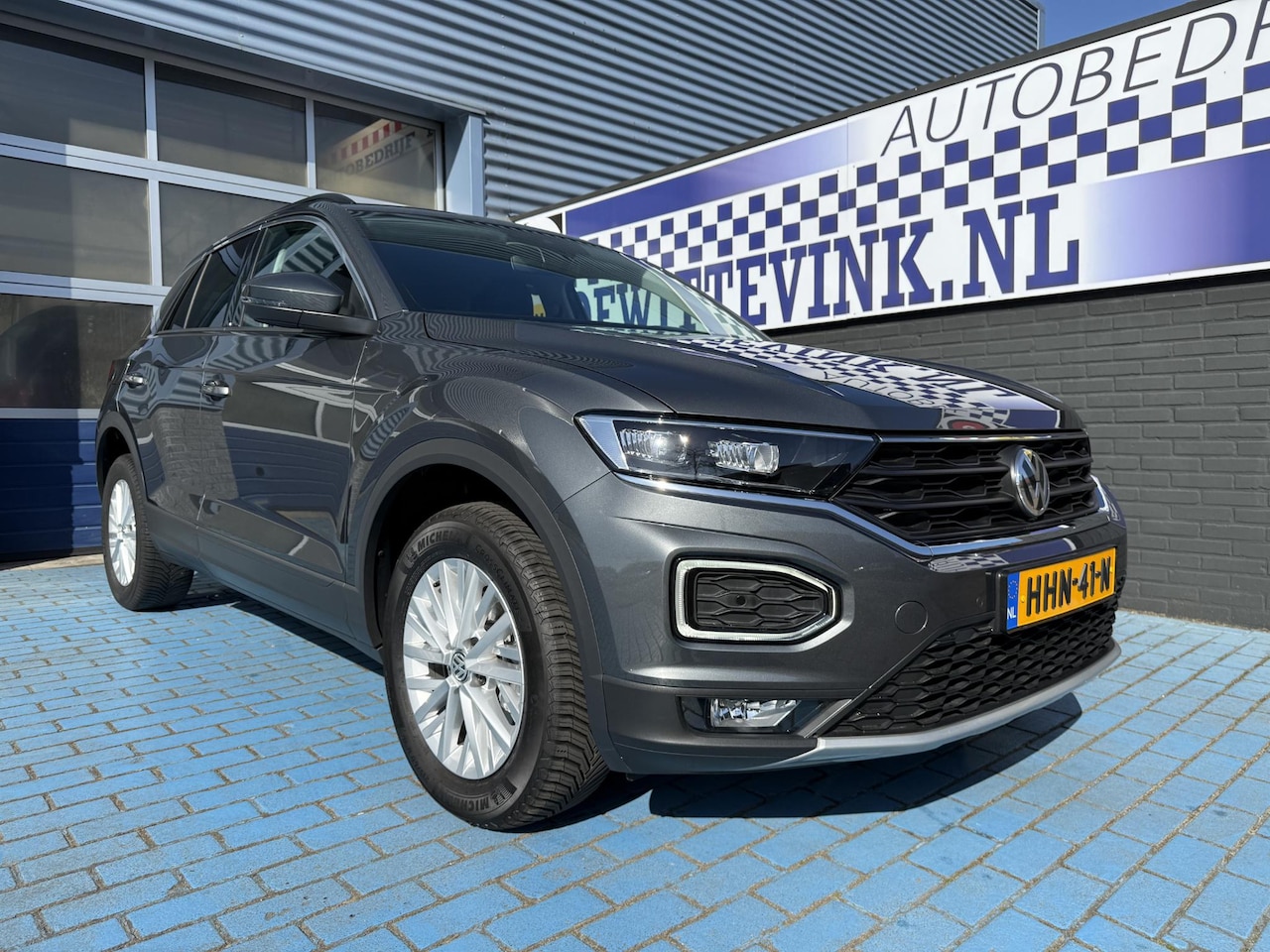 Volkswagen T-Roc - 1.5 TSI ADAP CRUISE NAVI PDC ALL SEASON - AutoWereld.nl
