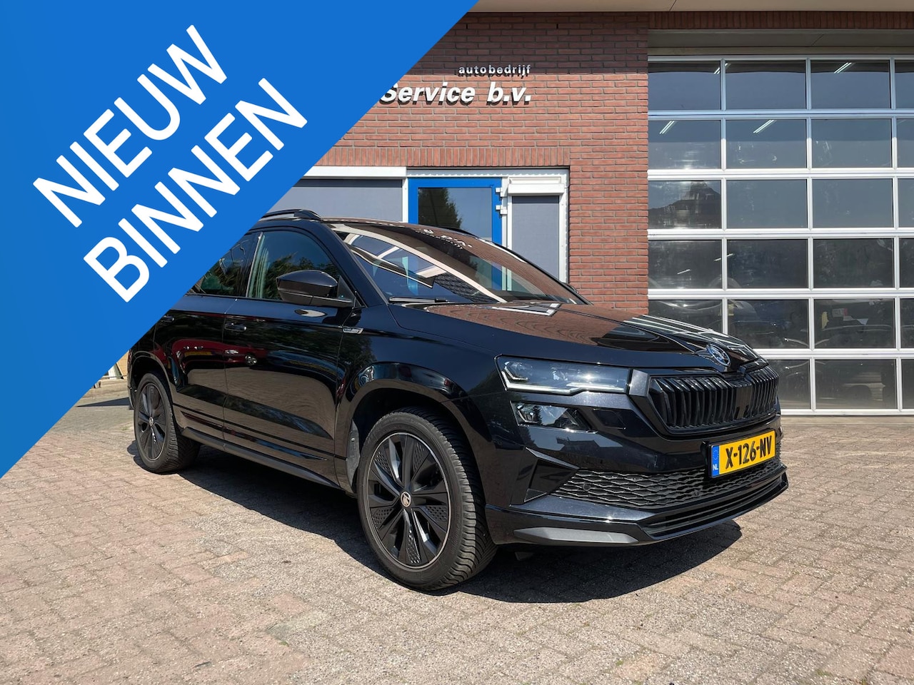 Skoda Karoq - 1.5 TSI ACT Sportline Business 1.5 TSI ACT Sportline Business - AutoWereld.nl