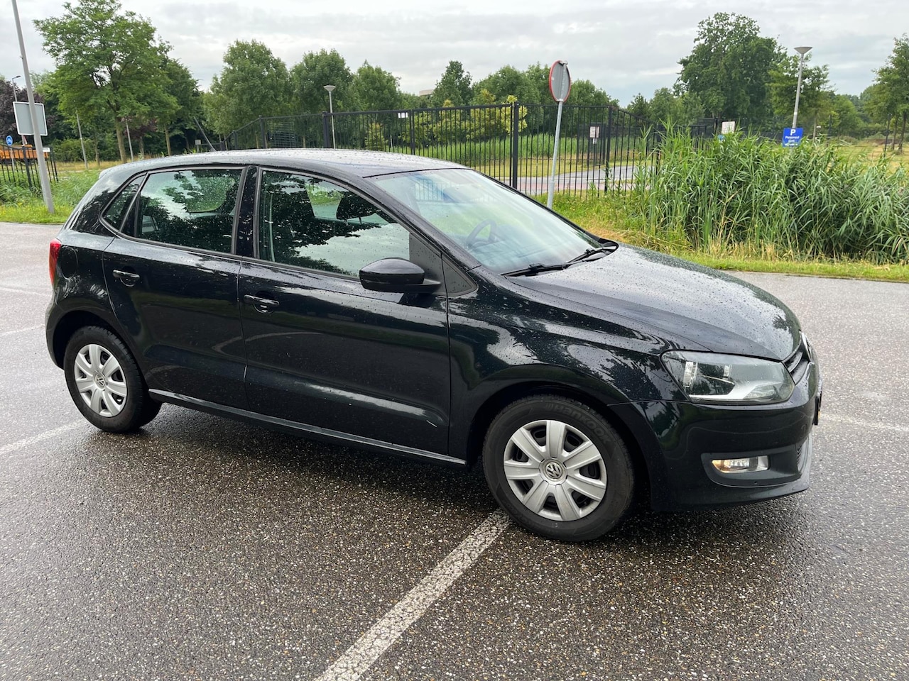 Volkswagen Polo - 1.4-16V Highline / 5 drs 2011 - AutoWereld.nl