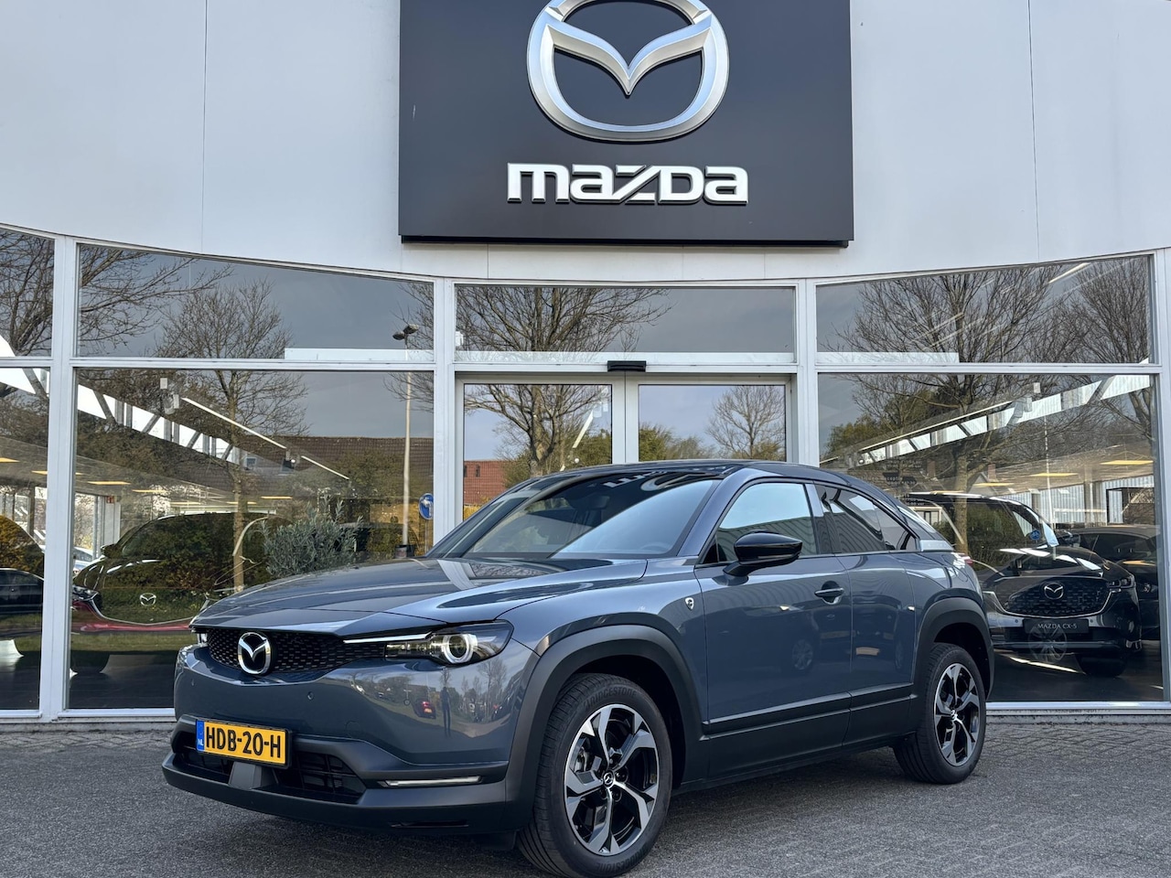 Mazda MX-30 - e-SkyActiv R-EV 170 Advantage Apple Carplay/ Android Auto, Navigatie, Parkeerhulp V+A, Ach - AutoWereld.nl