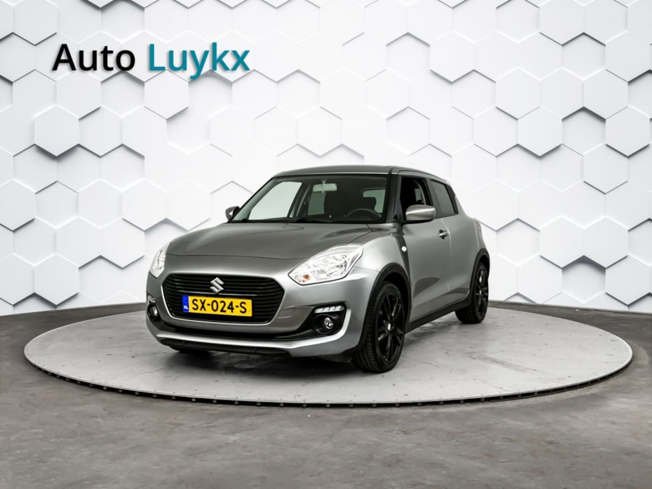 Suzuki Swift - 1.2 Sportline | Navigatie | 17'' L.M. Velgen | Dakspoiler - AutoWereld.nl