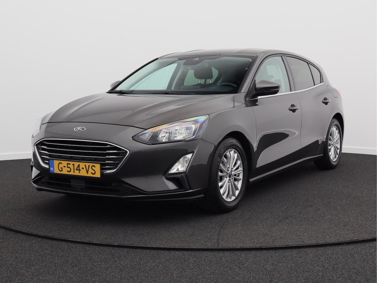 Ford Focus - 1.0 EcoBoost Titanium Business/ lage km/ zeer mooi! - AutoWereld.nl