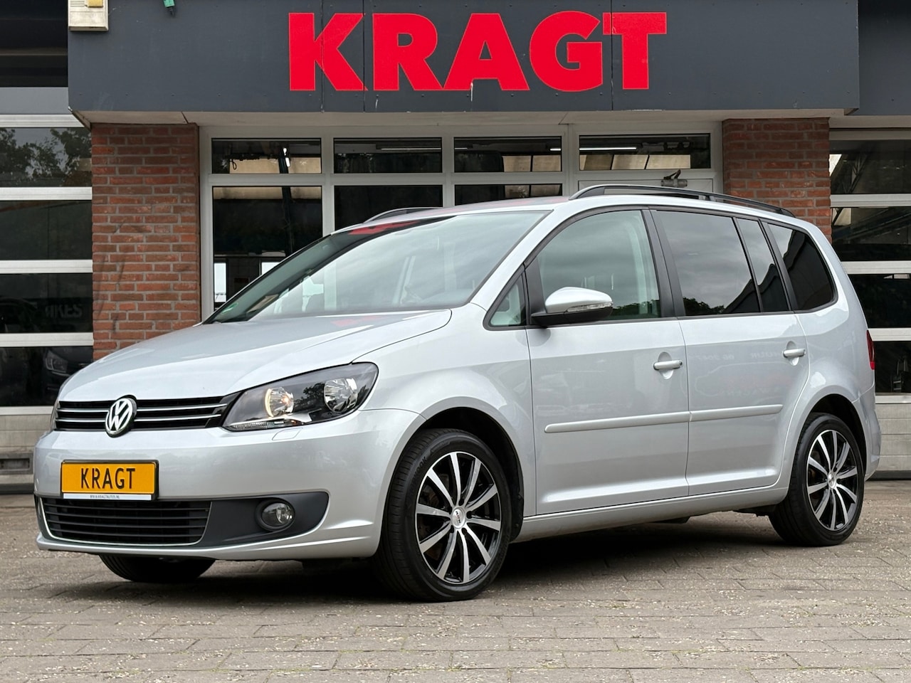 Volkswagen Touran - Comfortline 1.4 TSI 140 pk 7 persoons - navi - climate - AutoWereld.nl