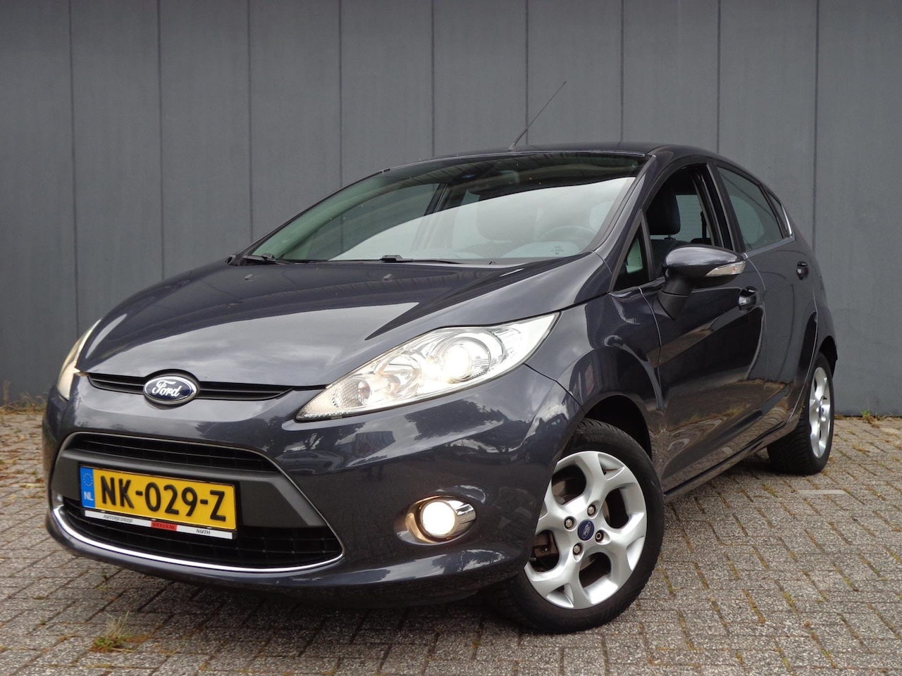 Ford Fiesta - 1.25i 16V Titanium 5drs Vol.Onderhoud - AutoWereld.nl