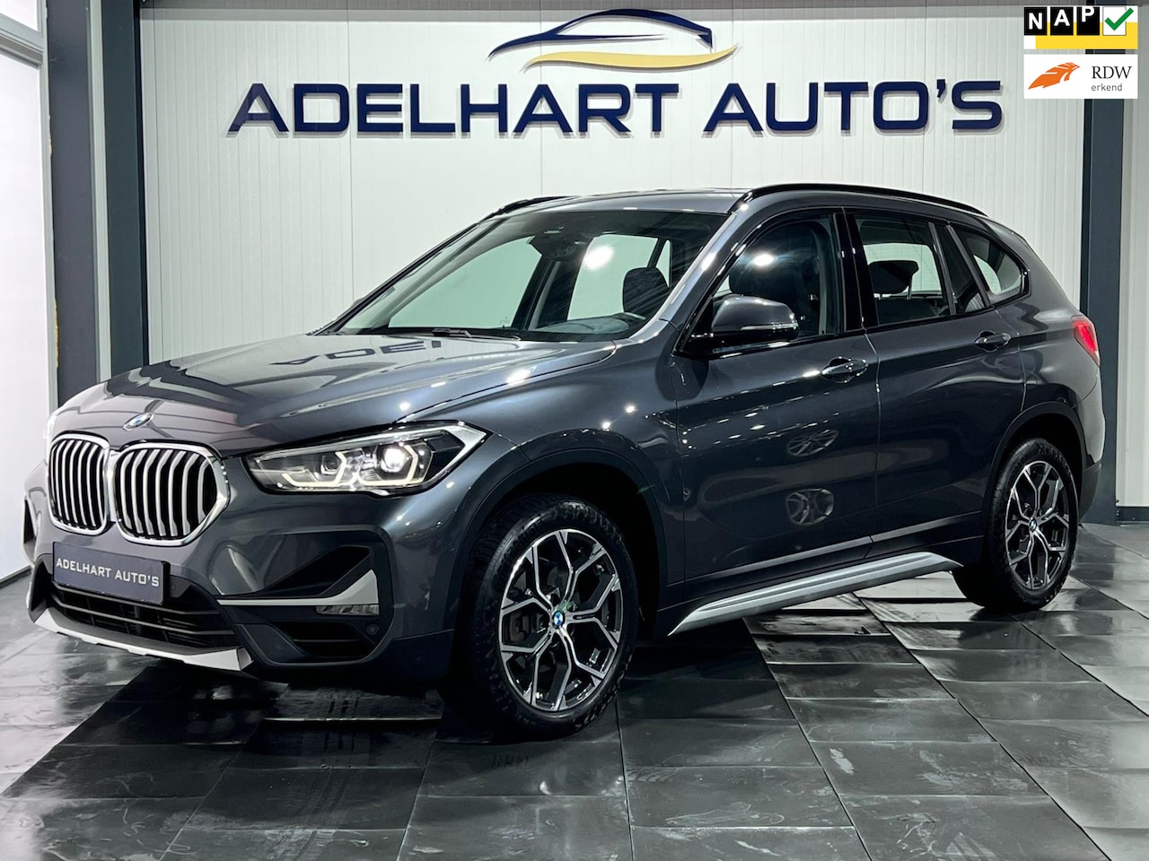 BMW X1 - SDrive18i X Line / Navigatie full map / Lederen interieur / Cruise control / etc.. - AutoWereld.nl