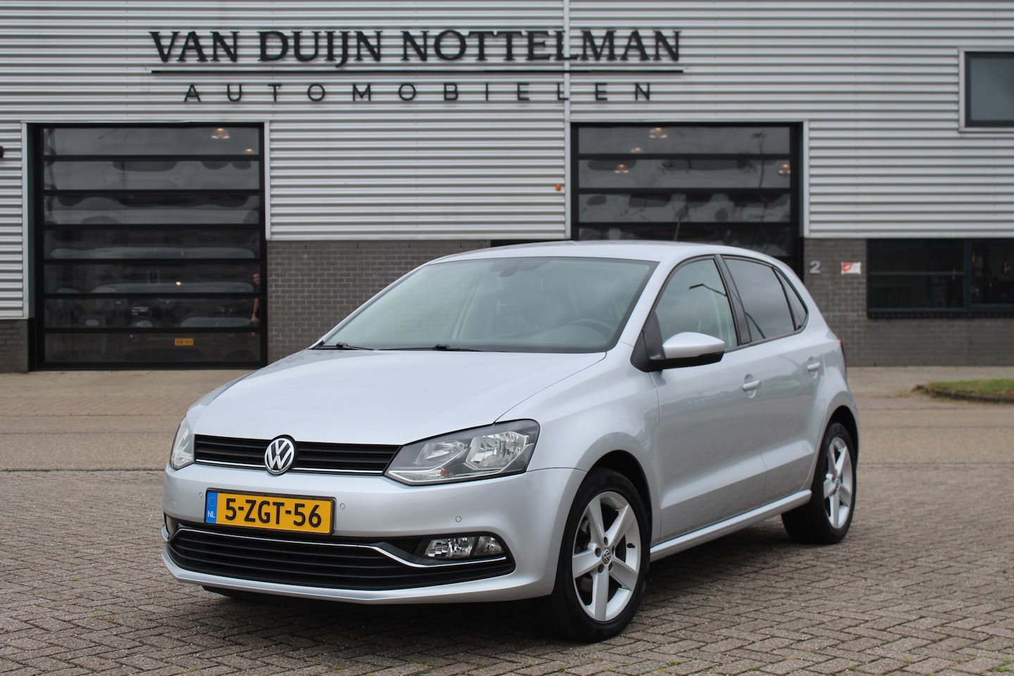 Volkswagen Polo - 1.2 TSI Highline / Automaat / Navigatie / N.A.P. - AutoWereld.nl