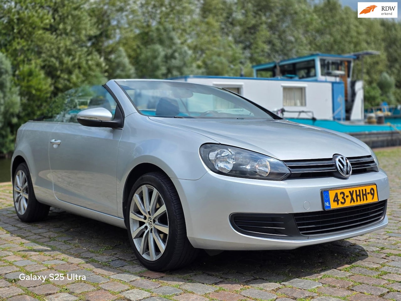 Volkswagen Golf Cabriolet - 1.2 TSI BlueMotion Cabriolet 2e eigenaar dealer onderhouden navigatie cruis control parkee - AutoWereld.nl