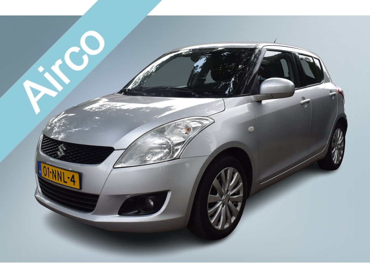 Suzuki Swift - 1.2 Exclusive EASSS Airco/Cruise/St.Verw. - AutoWereld.nl