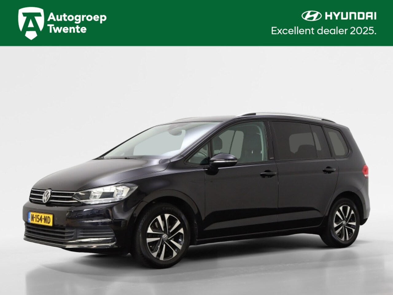 Volkswagen Touran - 1.0 TSI Comfortline | 7-persoons | Navigatie | Afn. Trekhaak | S - AutoWereld.nl