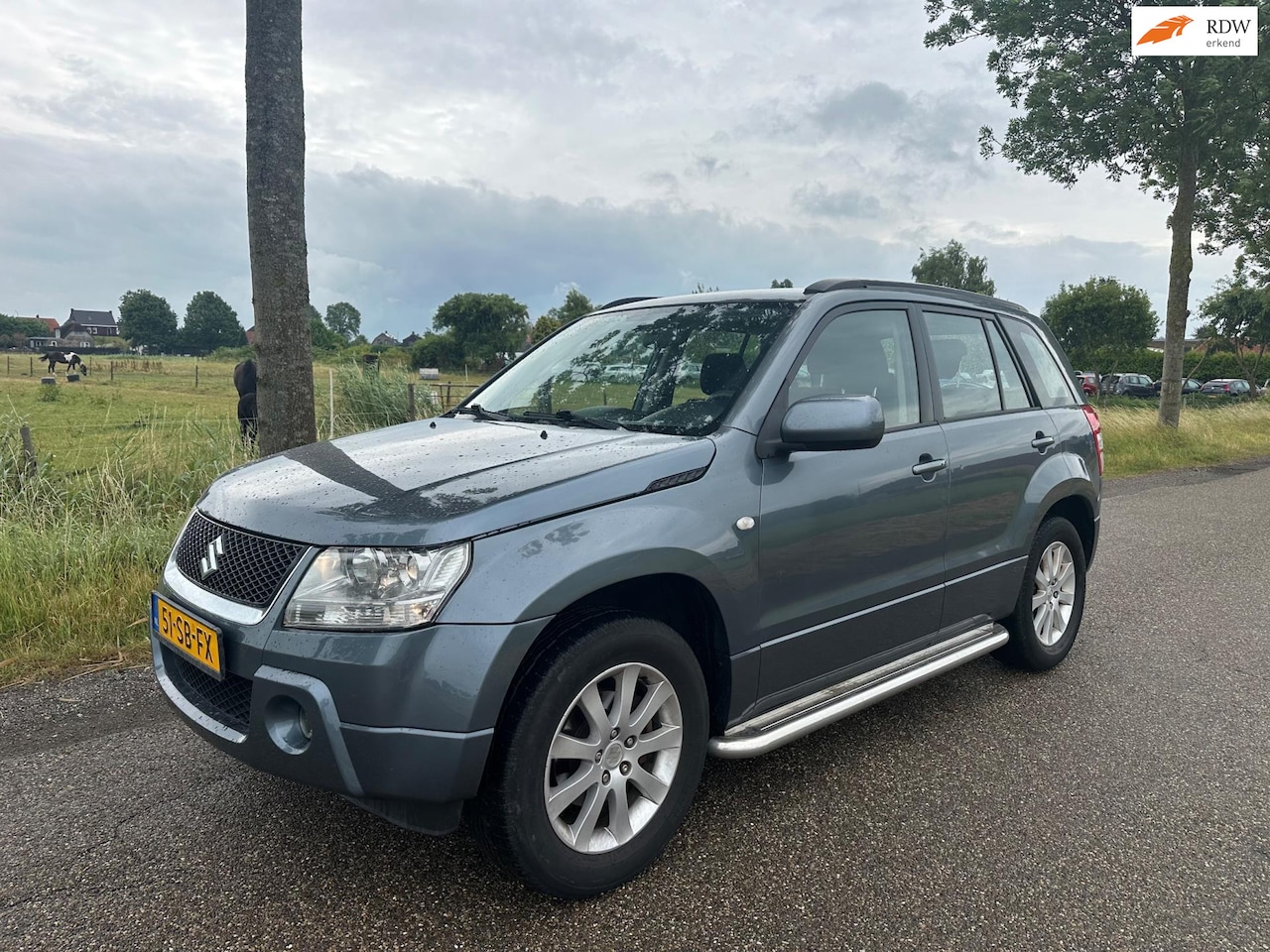 Suzuki Grand Vitara - 2.0-16V Exclusive 4x4 Airco - AutoWereld.nl