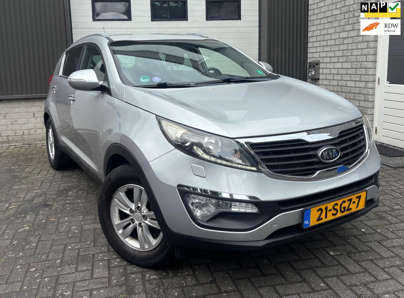 Kia Sportage - 1.6 GDI ISG X-clusive APK STOELVW CRUISE NAVI - AutoWereld.nl