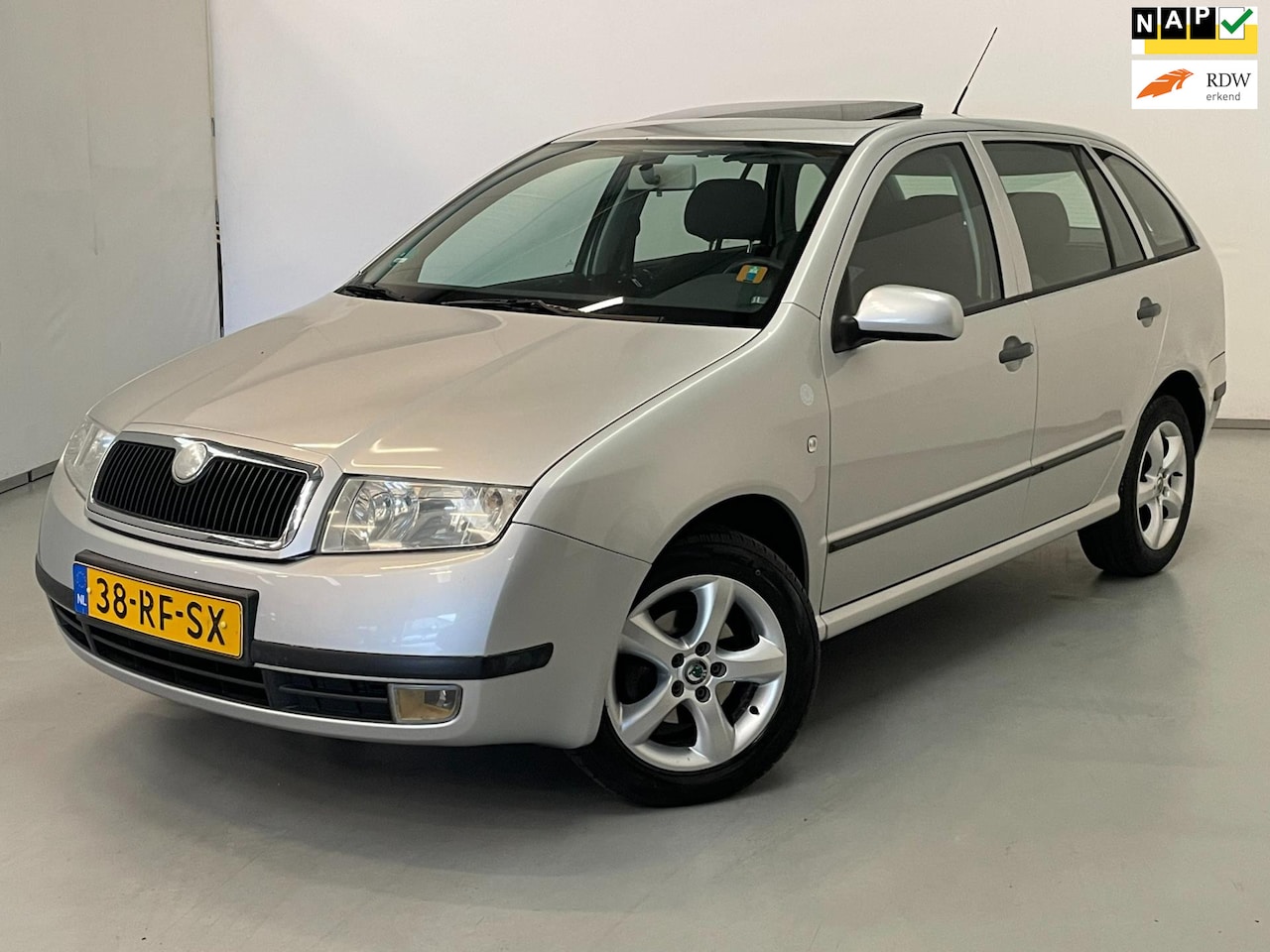 Skoda Fabia Combi - 1.4-16V Comfort / Schuifdak / Meeneemprijs - AutoWereld.nl