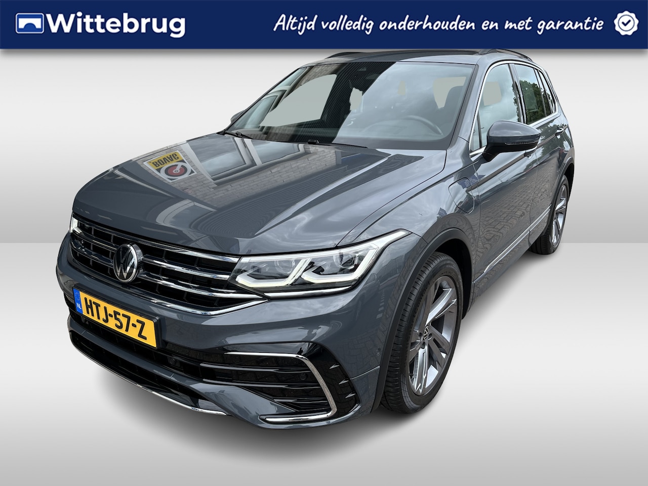 Volkswagen Tiguan - 1.4 TSI eHybrid R-Line / AUTOMAAT/ 2X R-LINE/ 245 PK / ELEKTR. TREKHAAK/ 19" LMV/ HEAD-UP - AutoWereld.nl