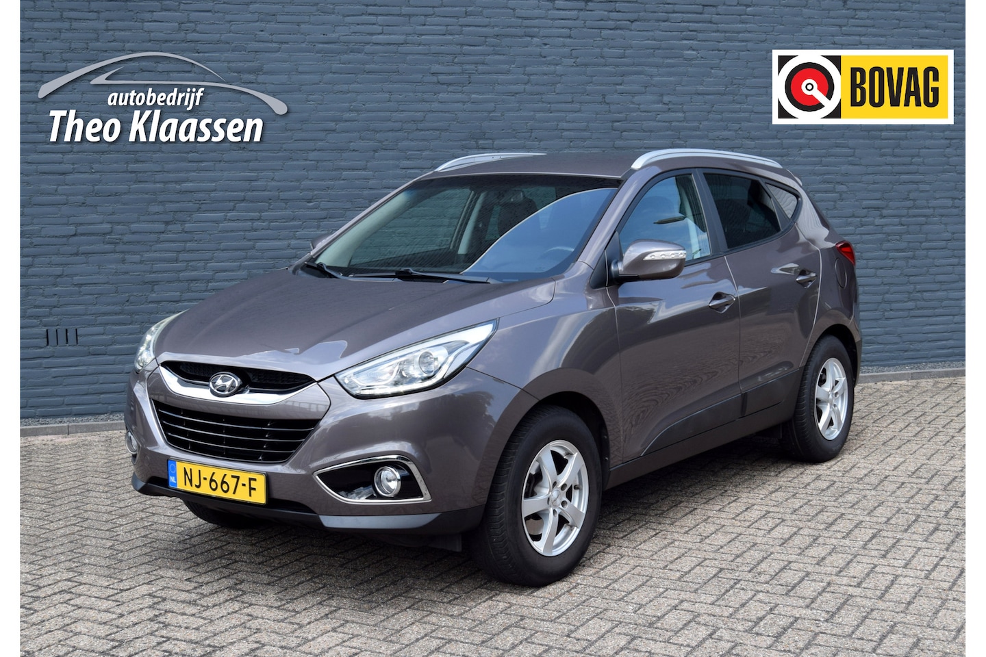 Hyundai ix35 - 1.6i GDI Go! Trekhaak Navi Camera stoelverwarming v&a - AutoWereld.nl
