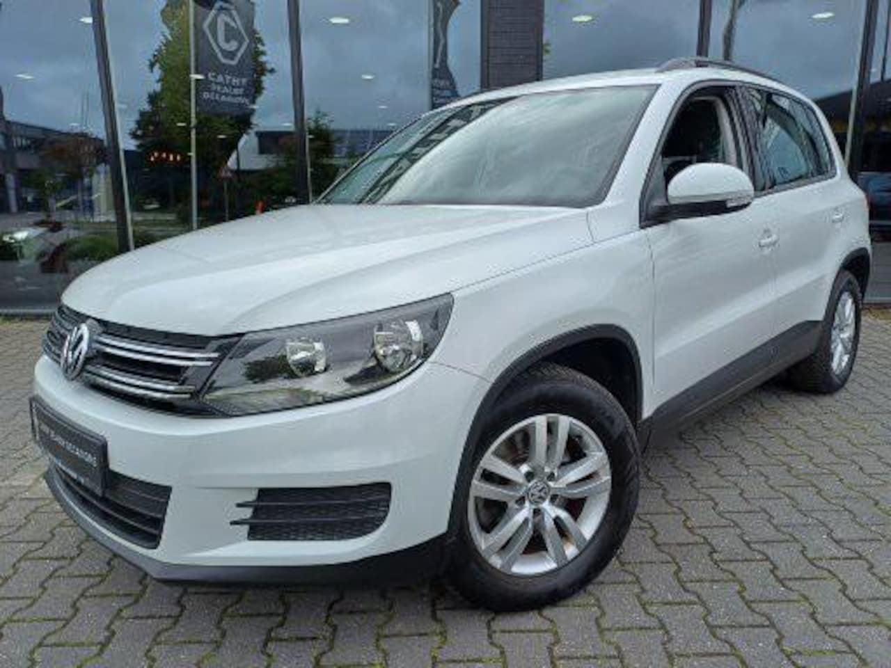 Volkswagen Tiguan - 1.4 TSI Comfort&Design Edition NAV Climate Cruise LM Velgen - AutoWereld.nl