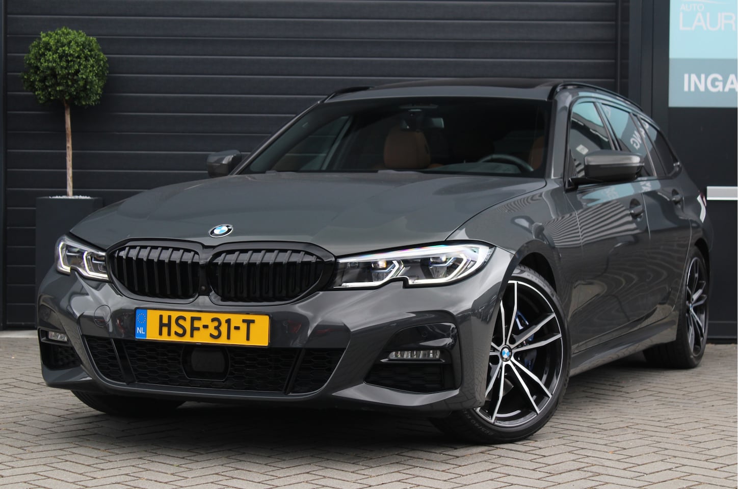BMW 3-serie Touring - 330i M sport | H&K | HUD | Pano | High Executive - AutoWereld.nl