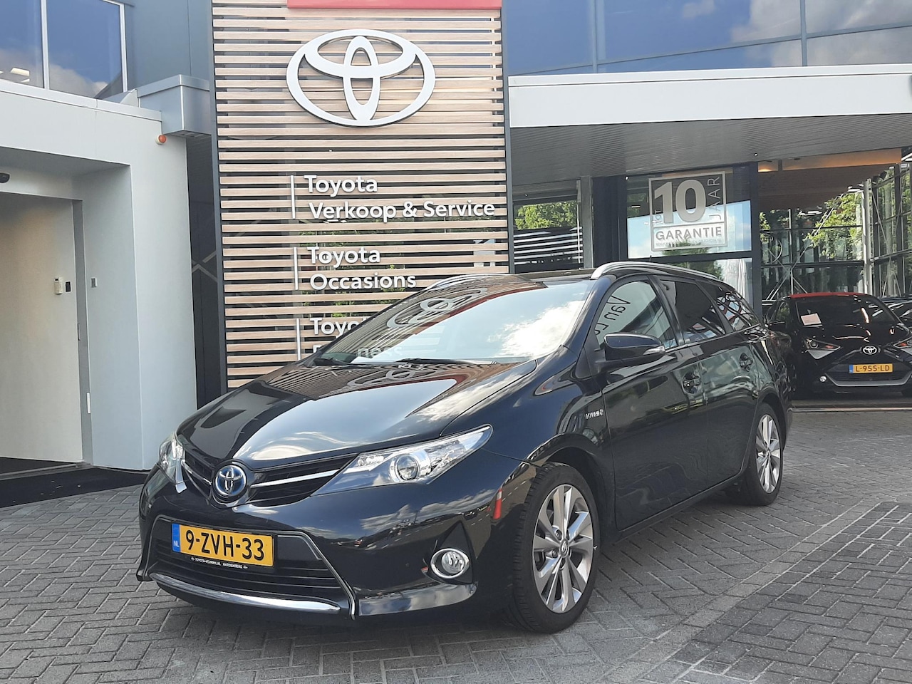 Toyota Auris Touring Sports - 1.8 Hybrid Dynamic GETINT GLAS 17''LICHTMETAAL CRUISE CAMERA BLUETOOTH HANDSFREE BELLEN - AutoWereld.nl