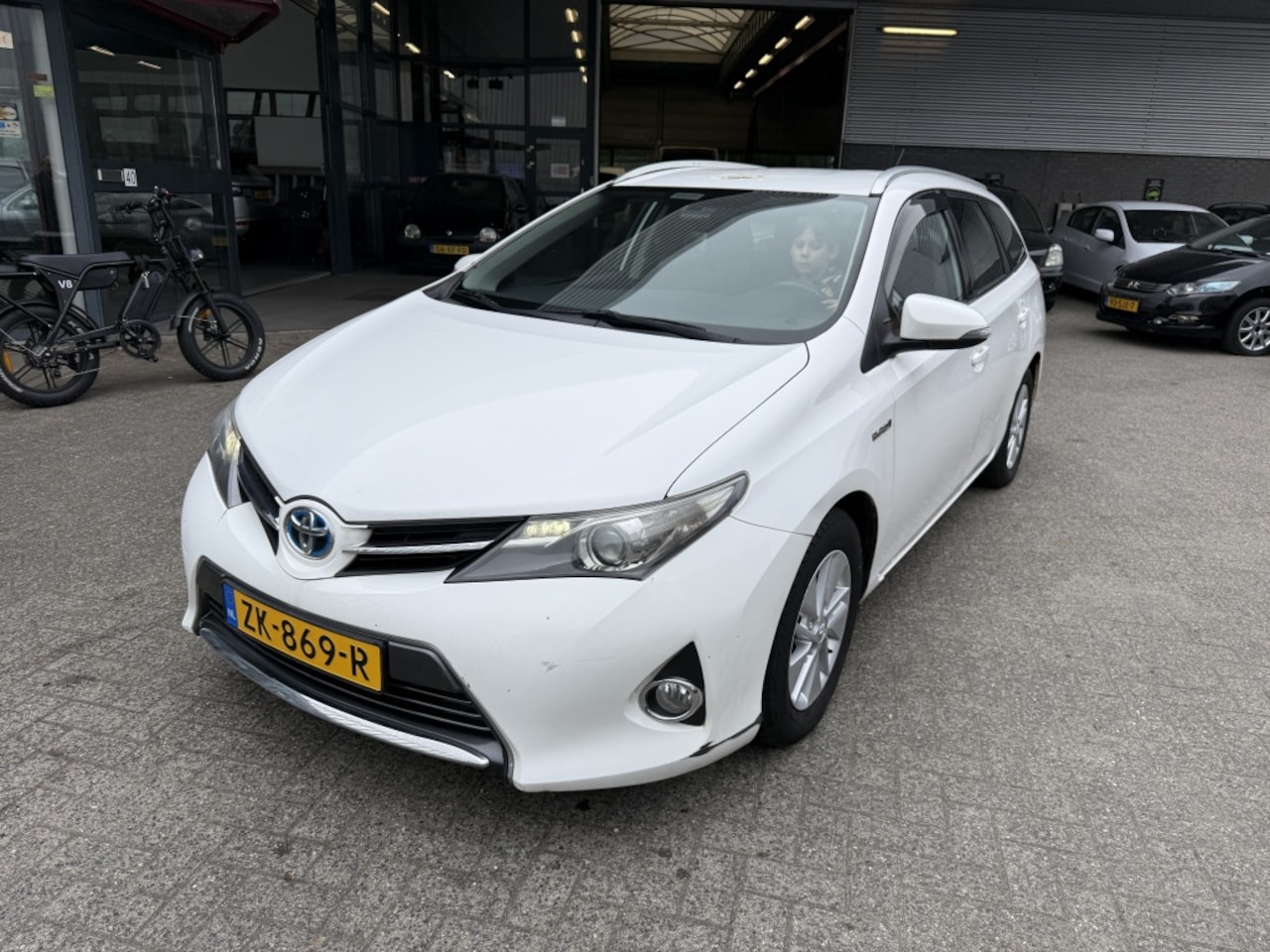 Toyota Auris Touring Sports - 1.8 Hybr. Aspiration - AutoWereld.nl