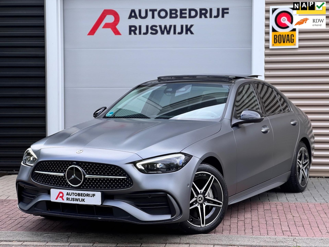 Mercedes-Benz C-klasse - 300 e AMG Line Memory/Pano/Dodehoek - AutoWereld.nl