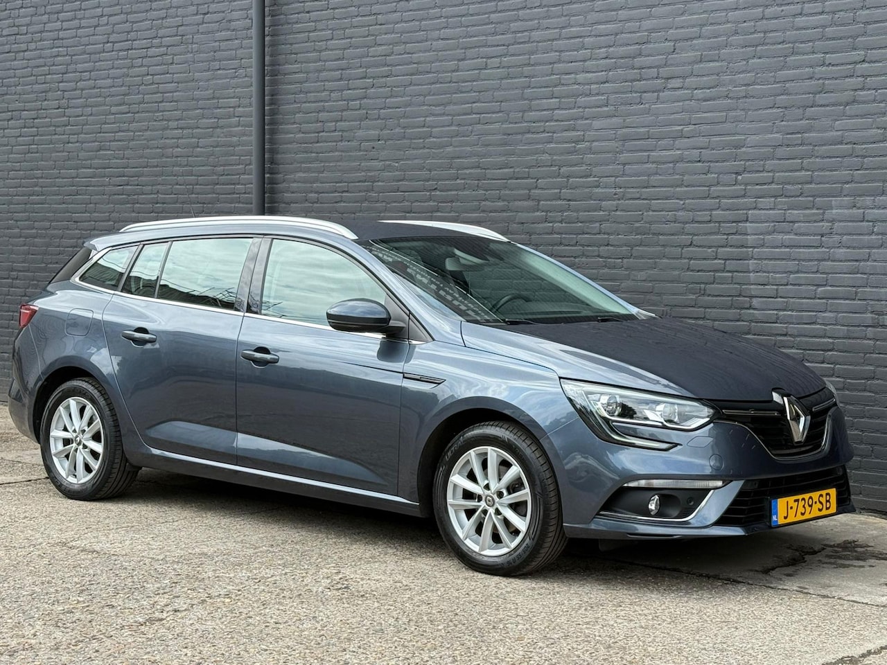 Renault Mégane Estate - 1.2 TCe Limited PDC | NAVI | TREKHAAK | CRUISE | NWE APK - AutoWereld.nl