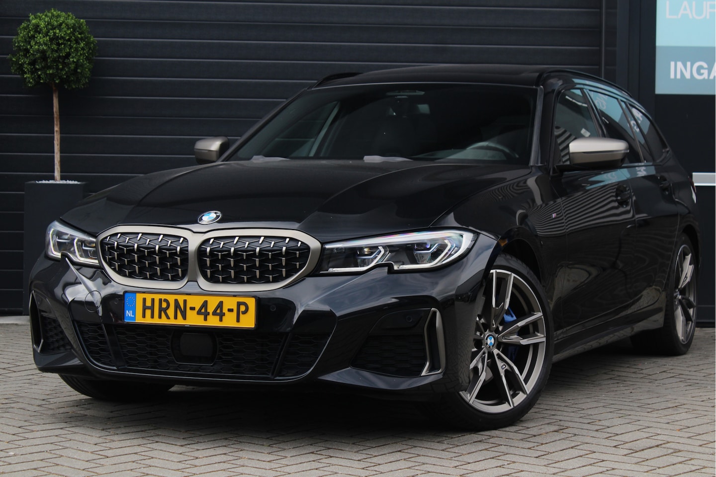 BMW 3-serie Touring - M340i xDrive | M kuipstoelen | Pano | HUD | Business Edition Plus - AutoWereld.nl