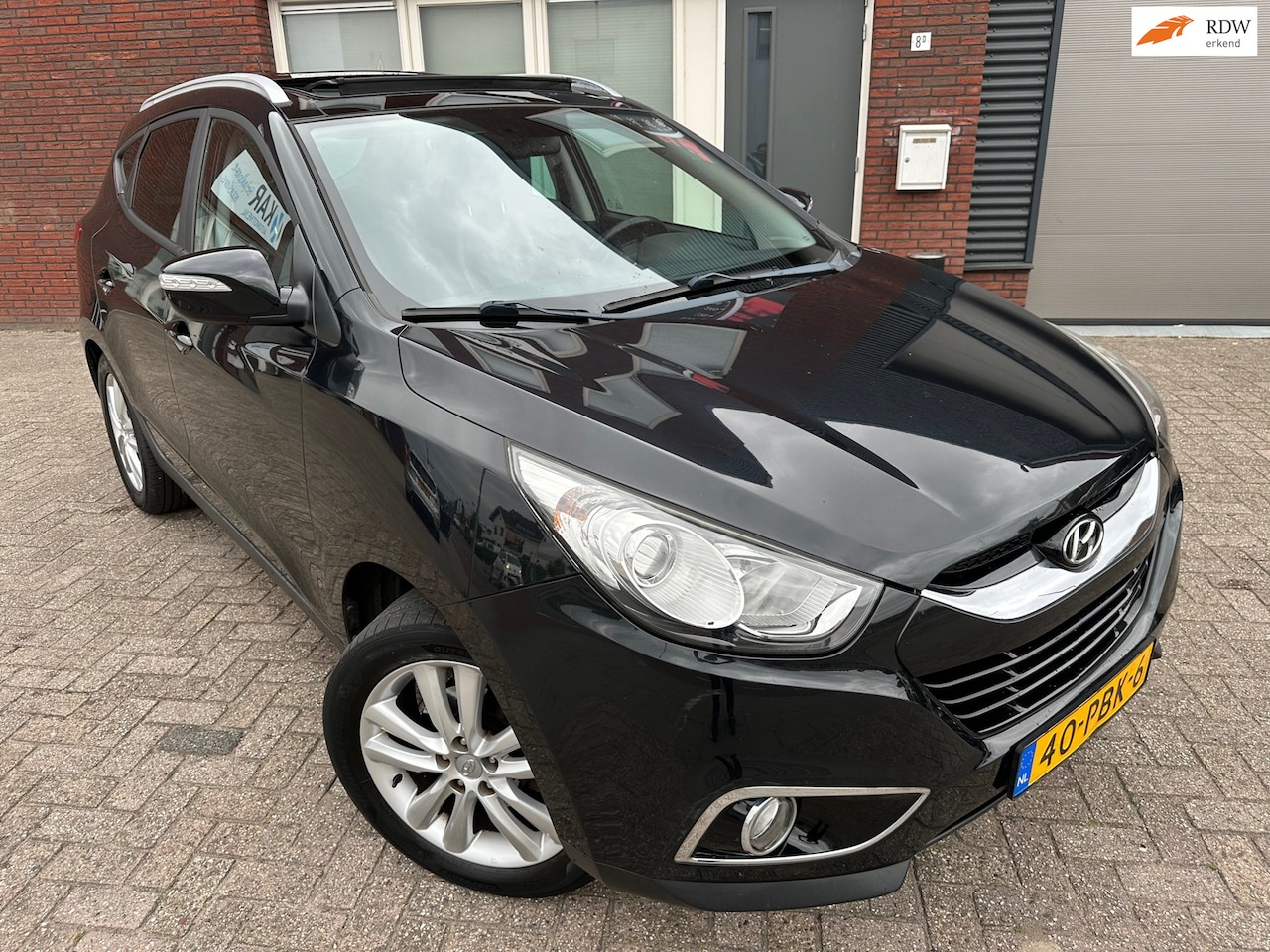 Hyundai ix35 - 2.0i i-Catcher / Schuifdak / Leder / Navi / Camera / PDC - AutoWereld.nl