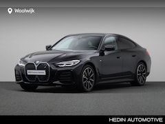 BMW i4 - eDrive40 High Executive 84 kWh | M-Sportpakket | 19'' M-Lichtmetaalvelgen Y-spaak | Achter