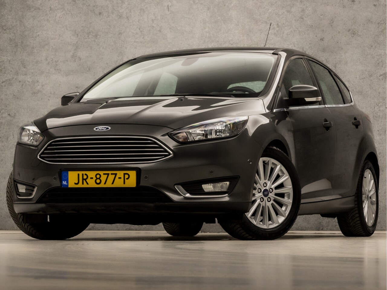 Ford Focus - 1.0 Titanium Sport (GROOT NAVI, CLIMATE, STOELVERWARMING, SPORTSTOELEN, TREKHAAK, LM VELGE - AutoWereld.nl