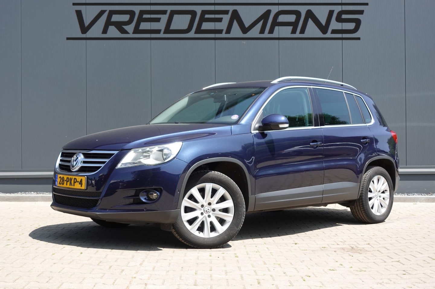 Volkswagen Tiguan - 1.4 TSI Sport&Style - AutoWereld.nl