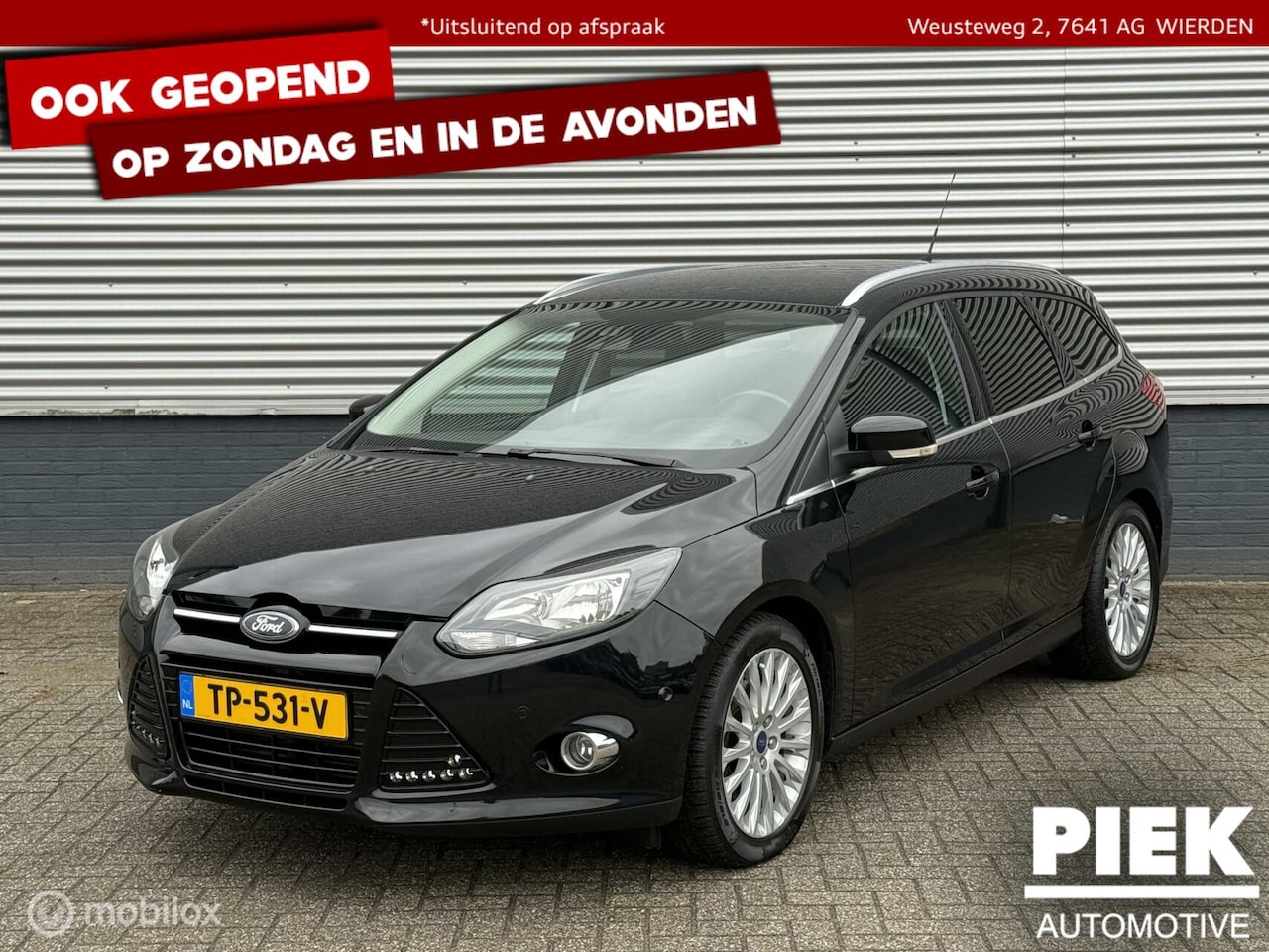Ford Focus Wagon - 1.6 EcoBoost Lease Titanium TREKHAAK - AutoWereld.nl