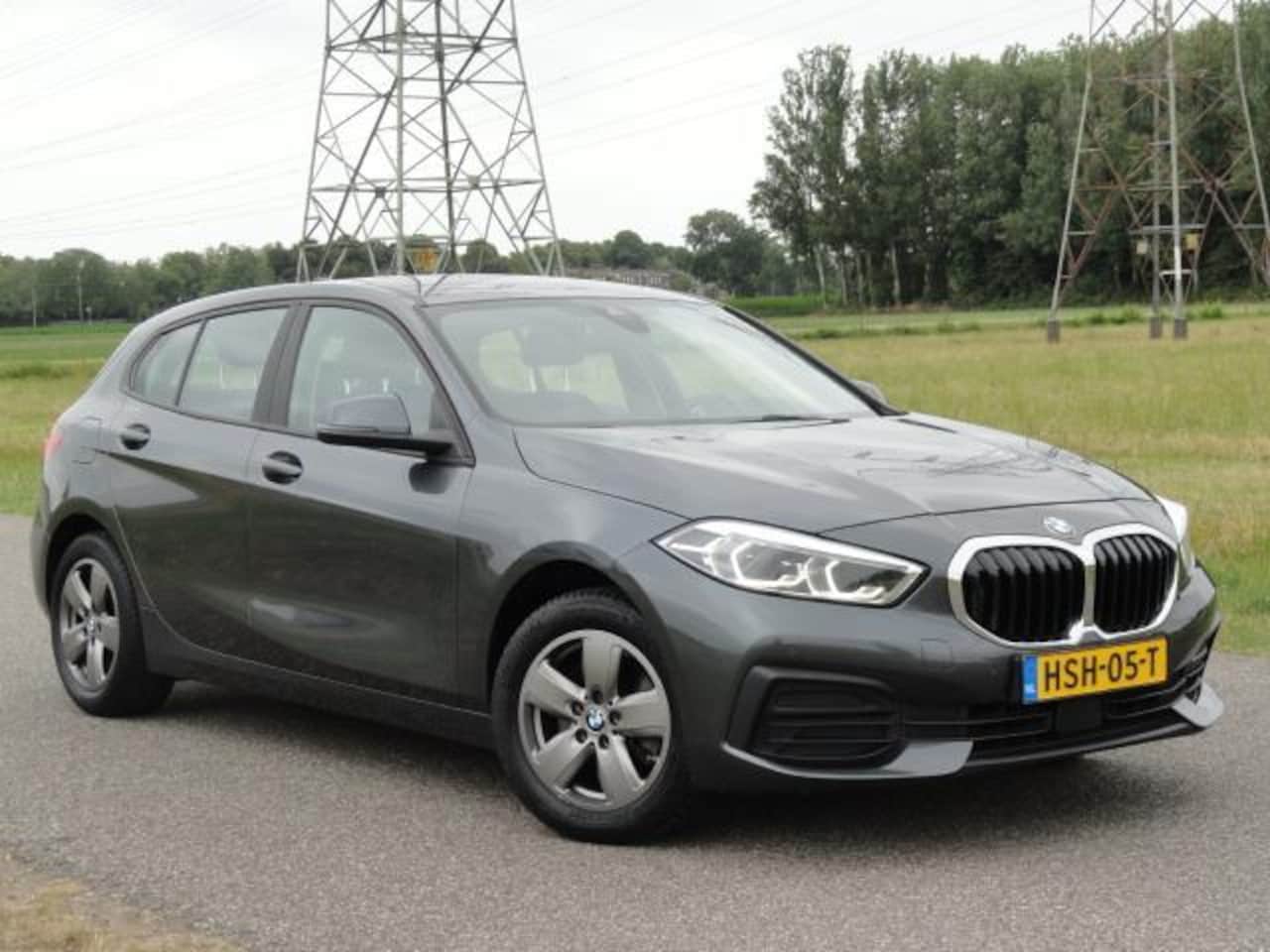 BMW 1-serie - 118i High Executive FULL LED i ECC I NAVIG I CAMERA - AutoWereld.nl