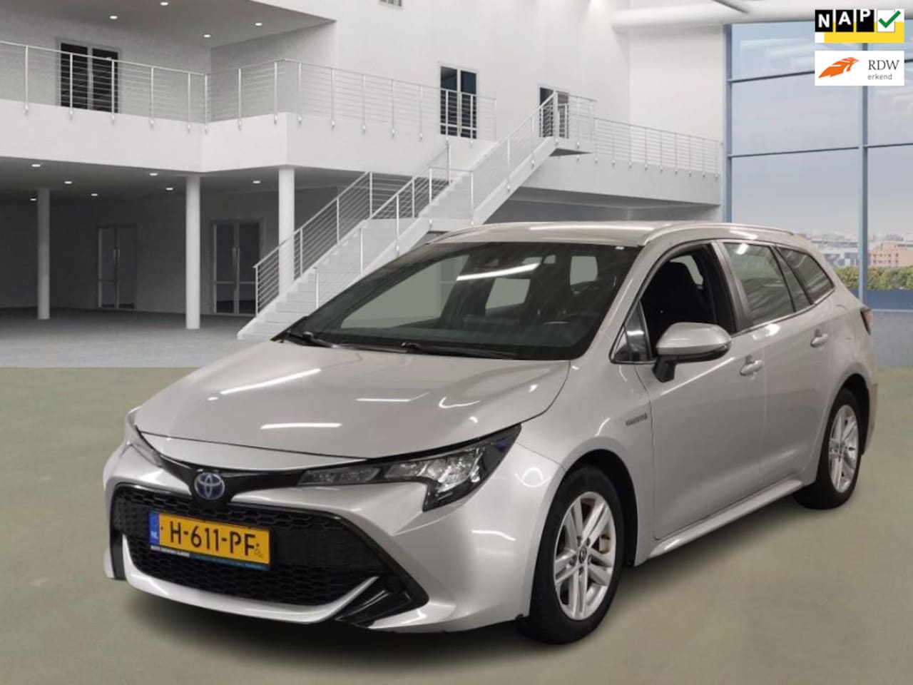 Toyota Corolla Touring Sports - 1.8 Hybrid Active EXPORT - AutoWereld.nl