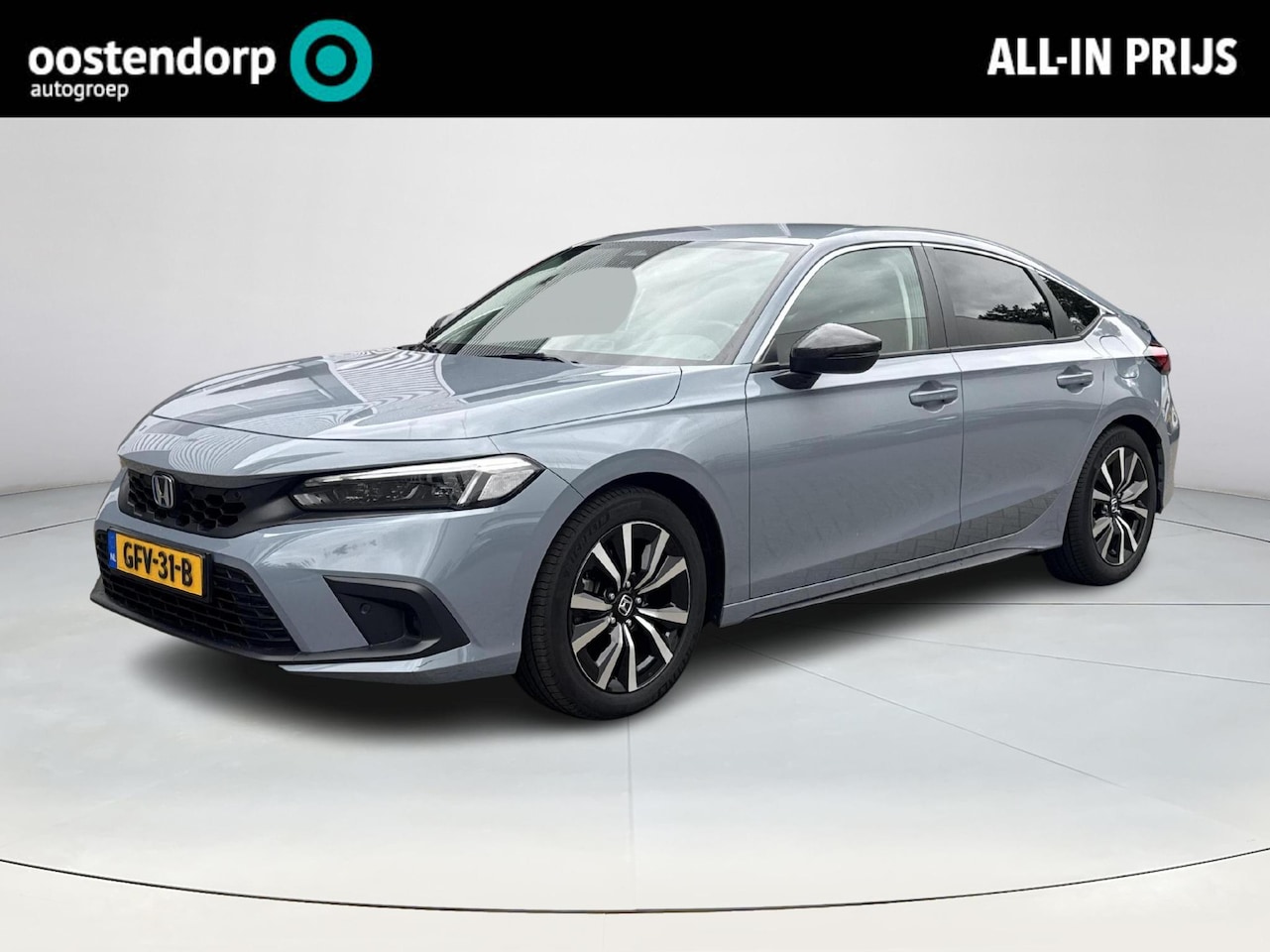 Honda Civic - 2.0 e:HEV Elegance sonic grey met CARBON PACK - AutoWereld.nl