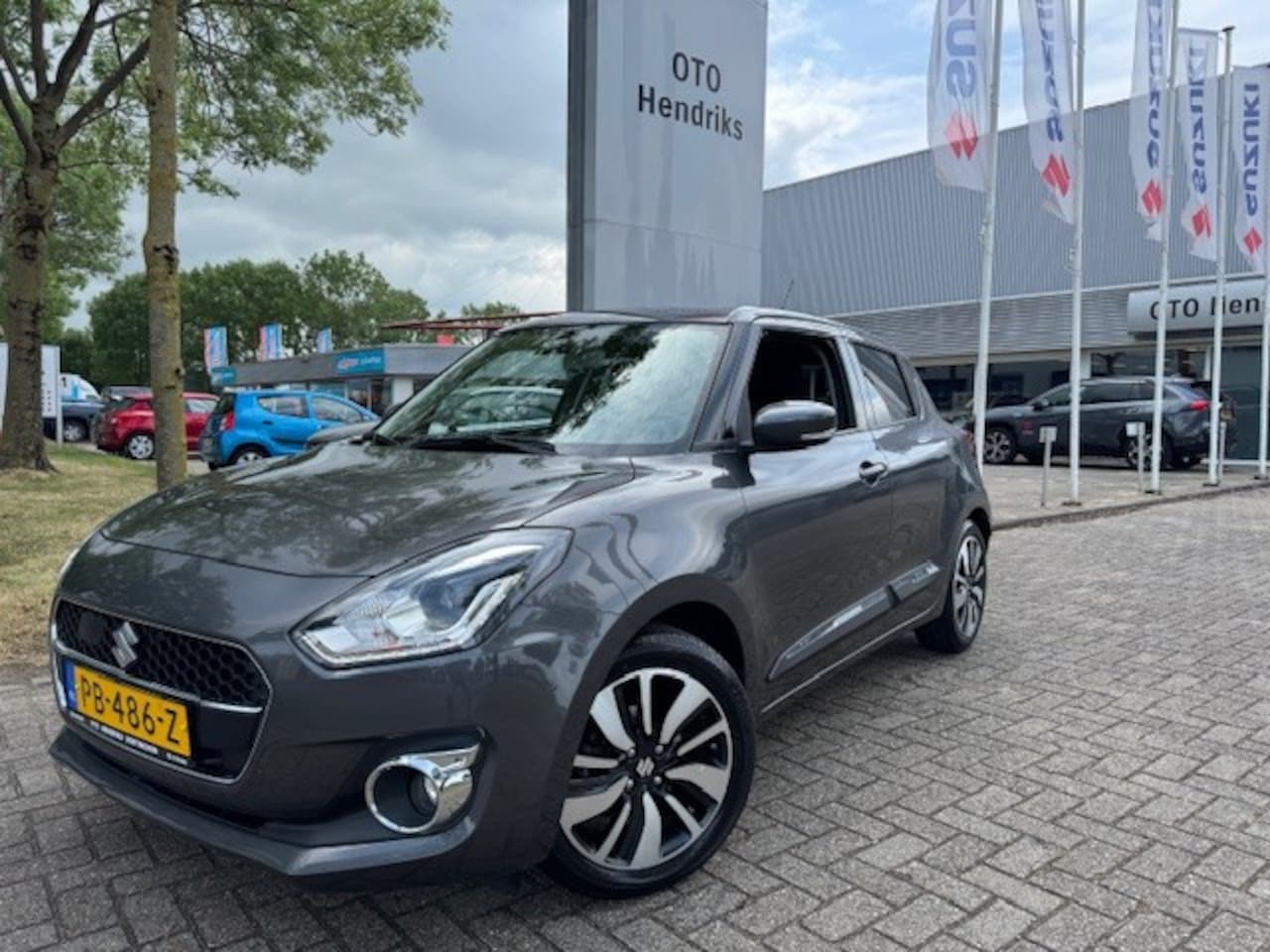 Suzuki Swift - 1.2 DualJet 90pk Smart Hybrid Stijl - AutoWereld.nl
