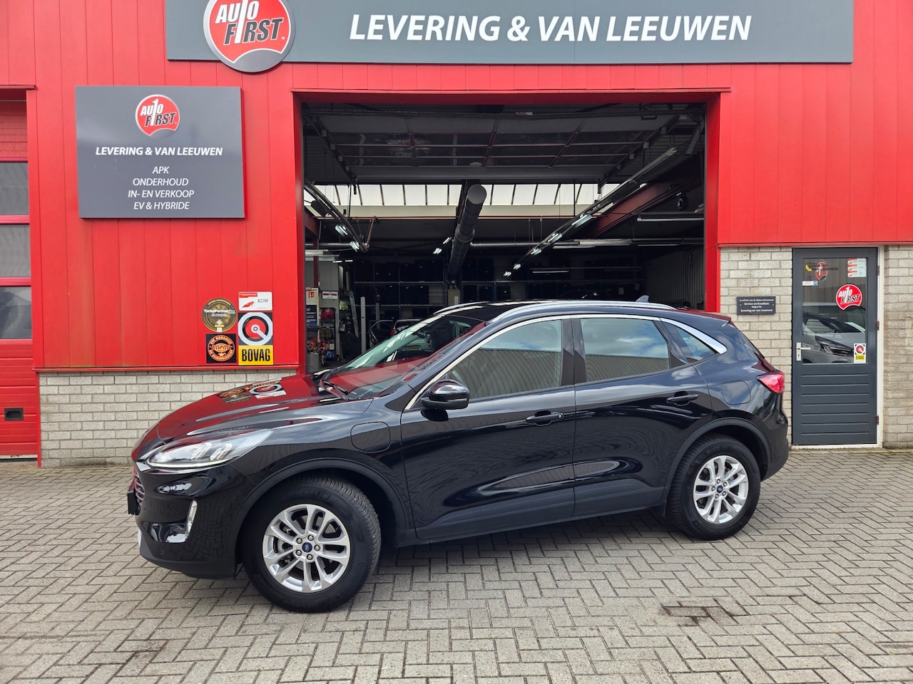 Ford Kuga - 2.5 PHEV Titanium Navigatie/ Camera/ Stoelverwarming/ Rijklaarprijs! - AutoWereld.nl