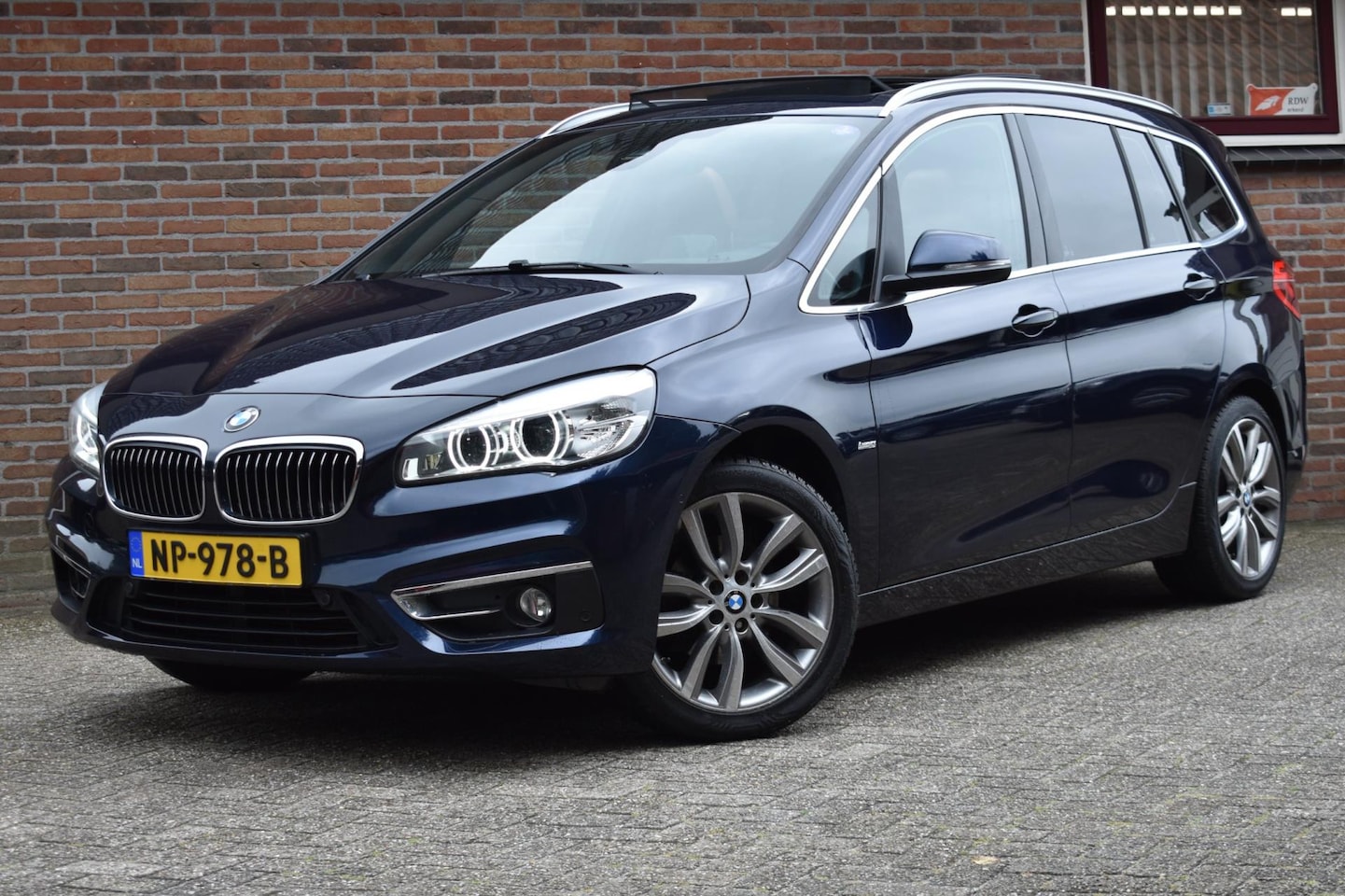 BMW 2-serie Gran Tourer - 218i 7p. High Executive '17 Pano Leder LED LEder Clima Cruise Inruil mogelijk - AutoWereld.nl