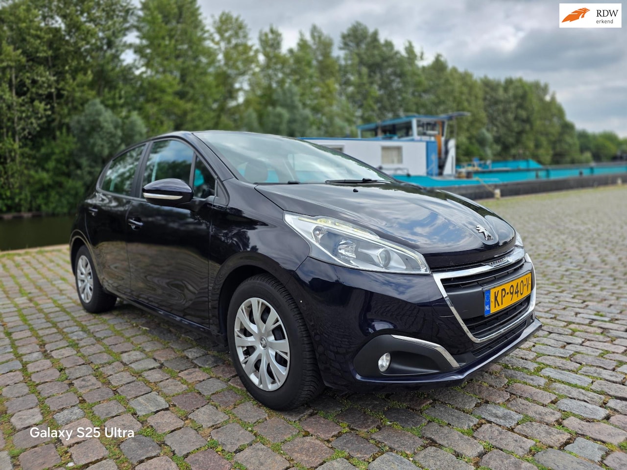 Peugeot 208 - 1.2 PureTech Blue Lion 2e eigenaar dealer onderhouden airco navigatie elektrische ramen pa - AutoWereld.nl