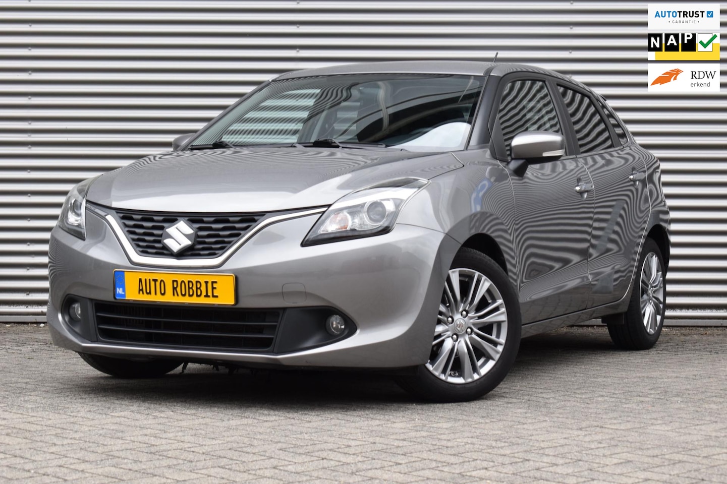 Suzuki Baleno - 1.0 Boosterjet High Executive 1.0 Boosterjet High Executive, Airco, Ecc, Cruise, Navi, Camera. - AutoWereld.nl