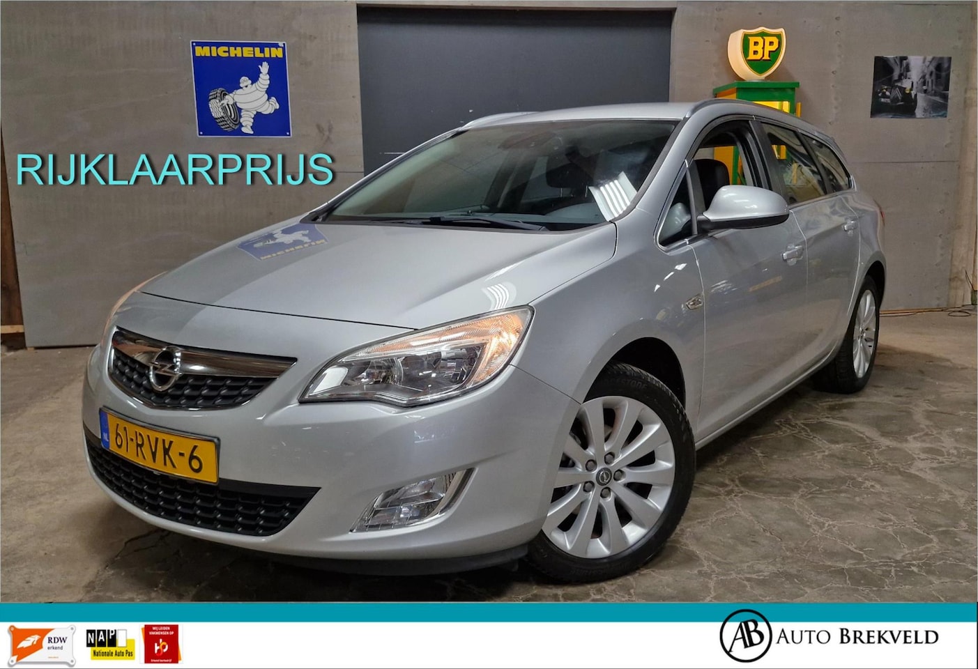 Opel Astra Sports Tourer - 1.4 Cosmo 101PK | Rijklaarprijs | Cruise | Clima | Navi | LMV | NAP - AutoWereld.nl