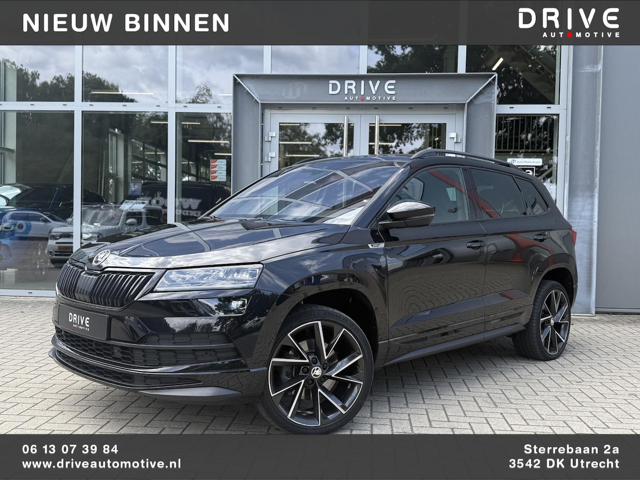 Skoda Karoq - 1.5 TSI ACT Sportline Business Ad.Cruise|Canton|19" - AutoWereld.nl