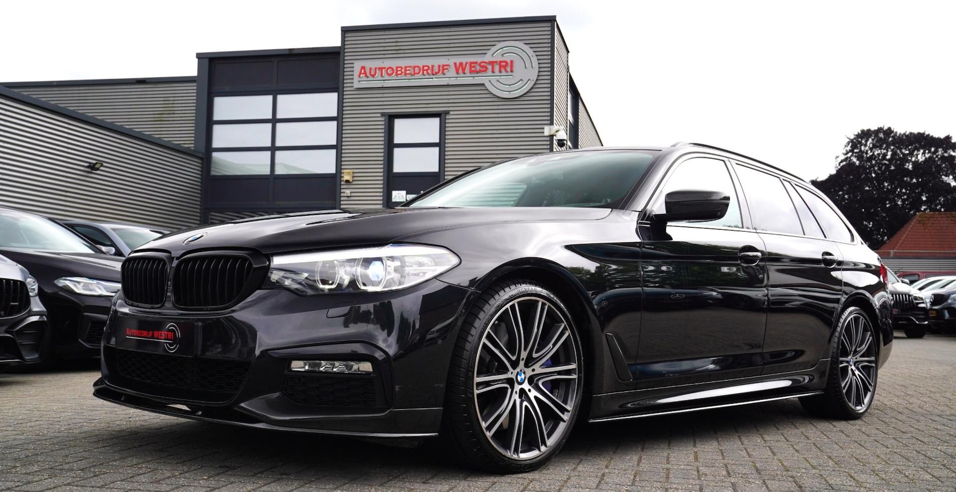 BMW 5-serie Touring - 540i xDrive High Executive | 360 Camera | Massage | Headup | Carbon delen exterieur | BMW - AutoWereld.nl