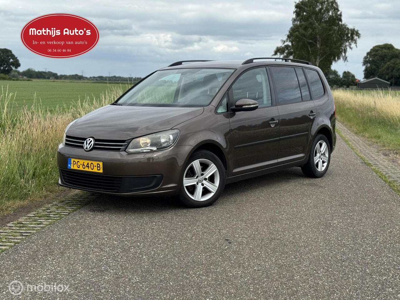 Volkswagen Touran - 1.4 TSI Comfortline Automaat Navi LMV - AutoWereld.nl