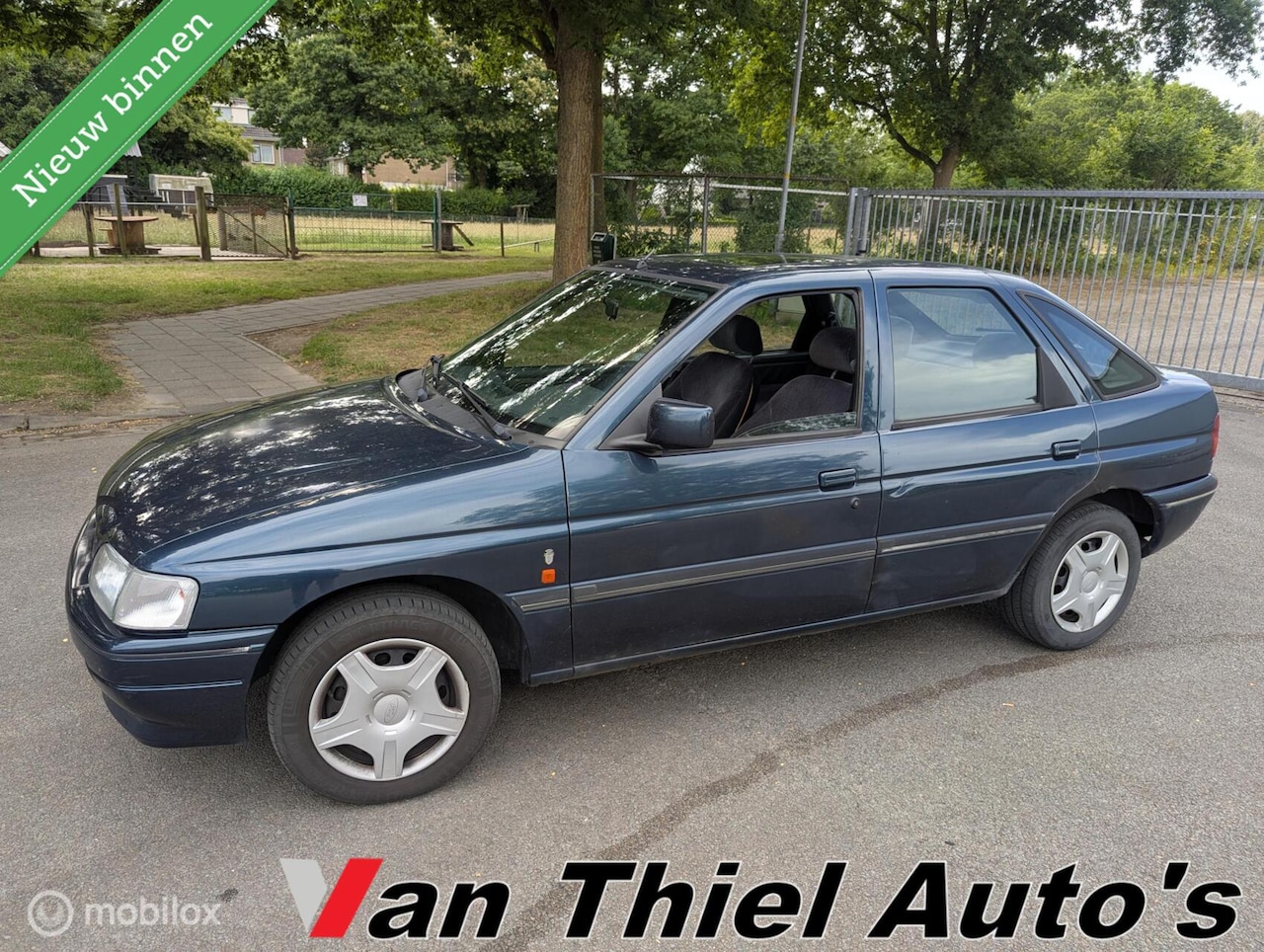 Ford Escort - 1.6 CLel.ramen opendak NAP - AutoWereld.nl