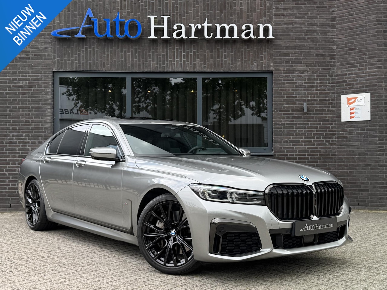 BMW 7-serie - 745e High Executive M-Sport PANO|H&K|ACC|HUD|Exclusief Nappa Leder - AutoWereld.nl