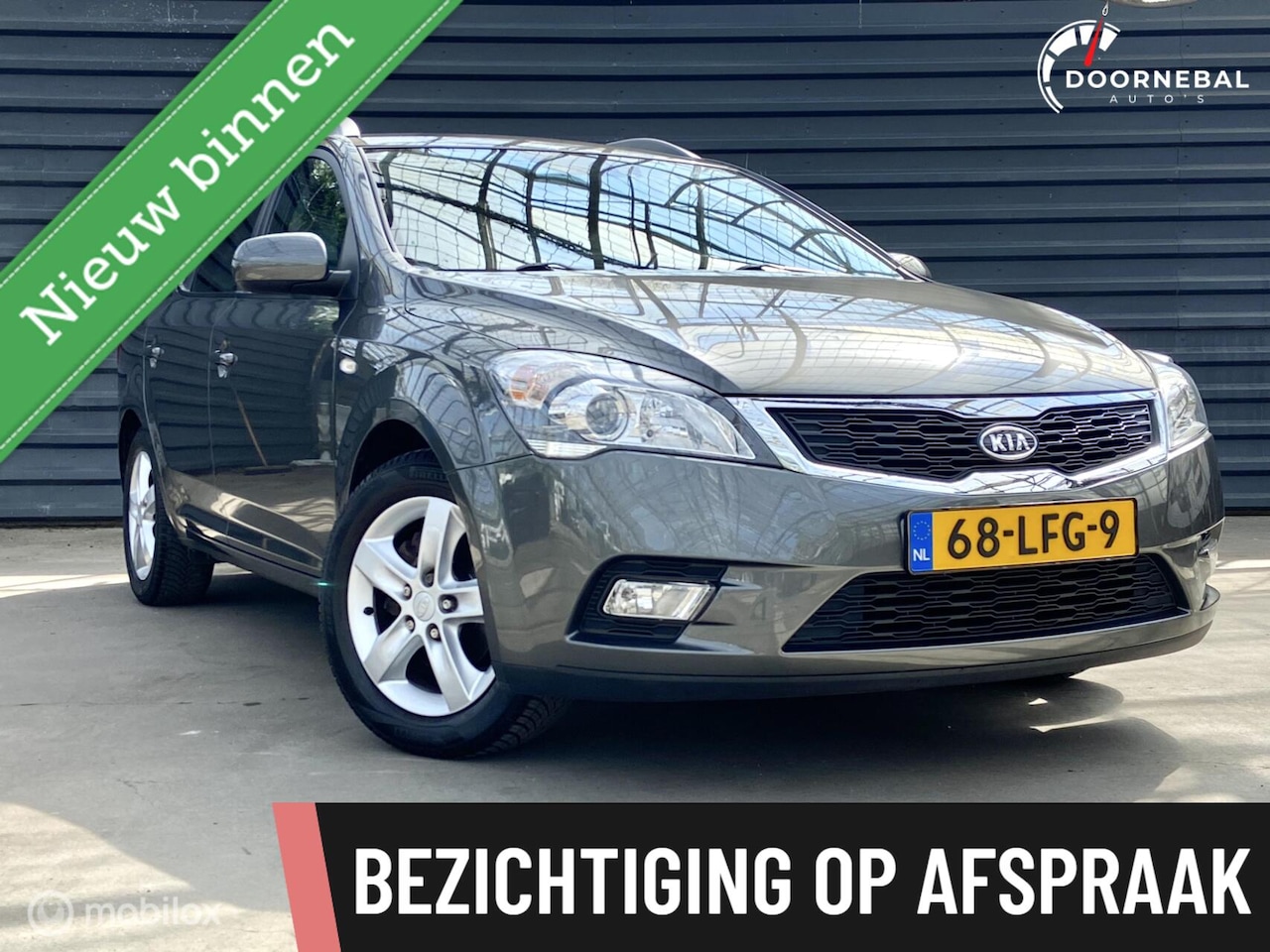 Kia Cee'd Sporty Wagon - 1.4 CVVT X-ecutive 1.4 CVVT X-ecutive - AutoWereld.nl