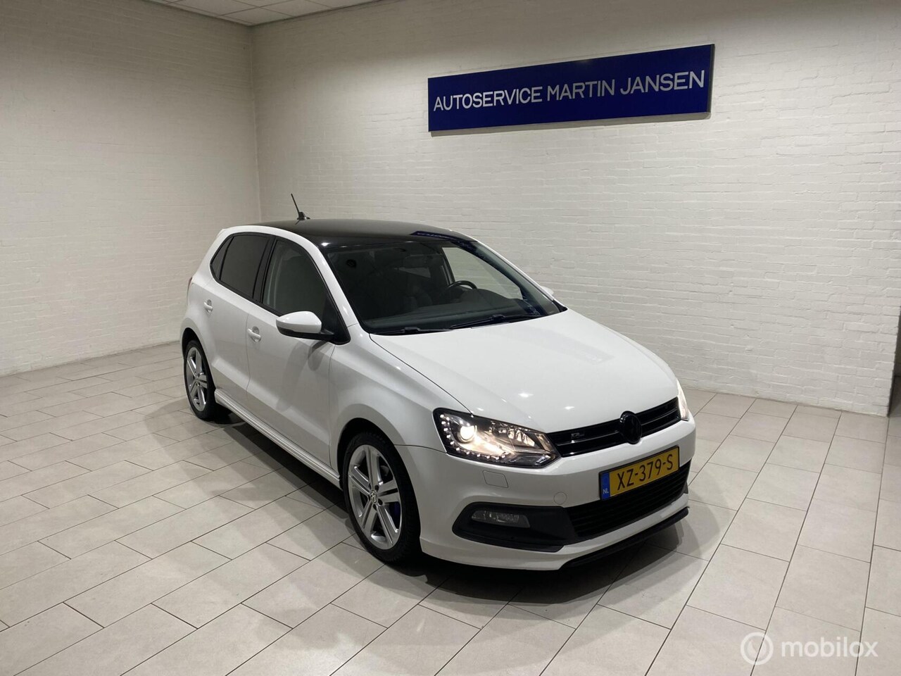 Volkswagen Polo - 1.2 TSI Highline R-line - AutoWereld.nl