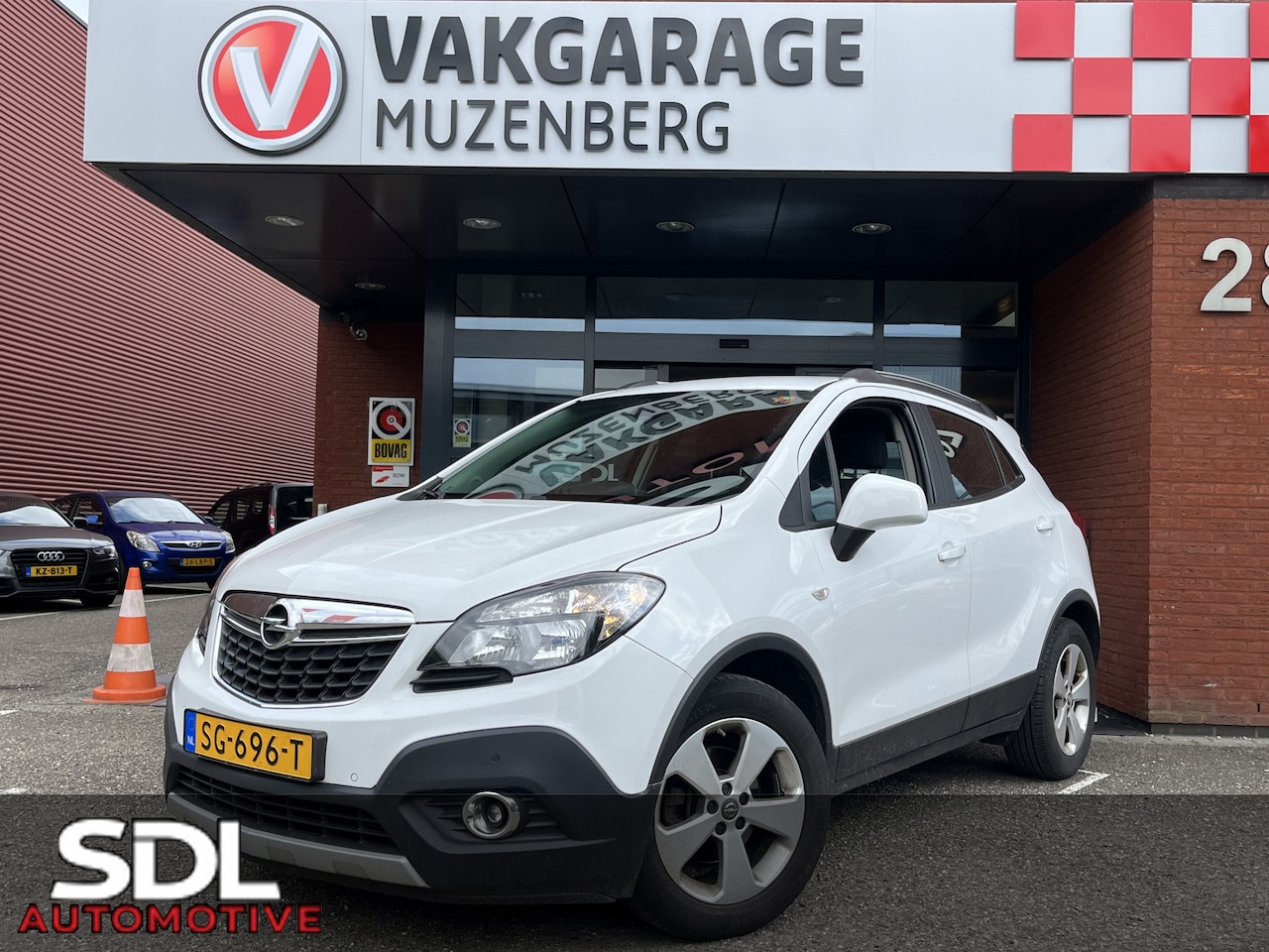 Opel Mokka - 1.4 T Cosmo // NAVI // CRUISE // PDC // TREKHAAK // AIRCO // STOELVERWARMING // LICHT META - AutoWereld.nl