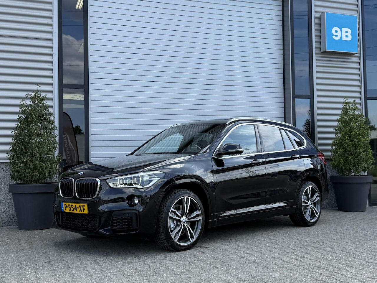 BMW X1 - sDrive20i M Sport Pano | Trekhaak | Leder | Stoelverwarming | Navi | LED | Comfort Access - AutoWereld.nl