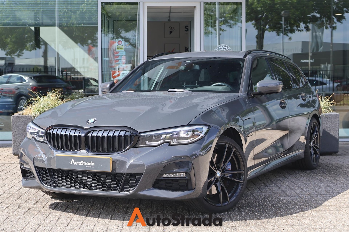 BMW 3-serie Touring - (g21) 330e M-Sport 292pk | Cruise | Climate | Carplay | Navi | LED | Sfeer | **Dravitgrau* - AutoWereld.nl